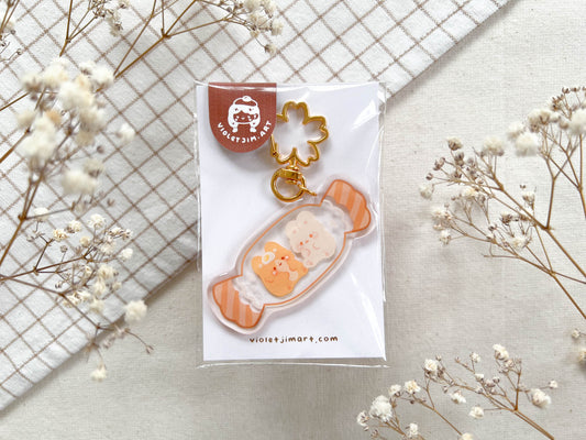 Cute Acrylic Keychain with Golden Cherry Blossom Hanger - Transparent Candy featuring Mochi the Corgi and Bunny Bonbon